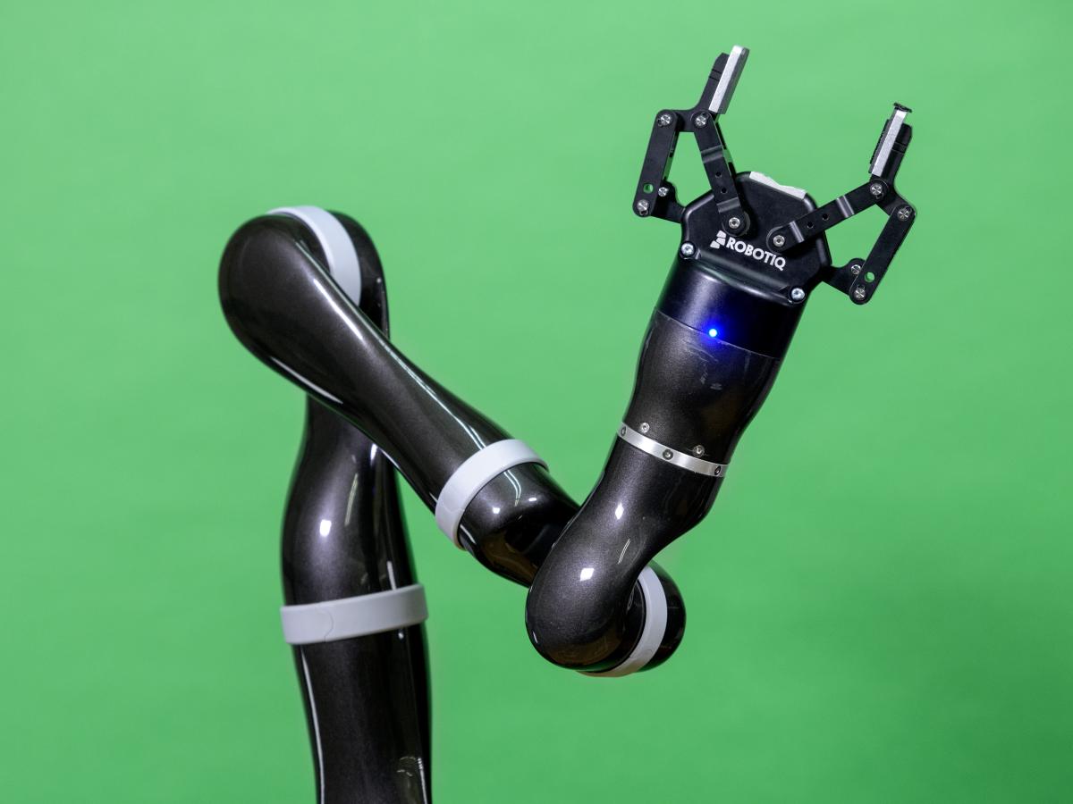 A robot arm pointing upwards